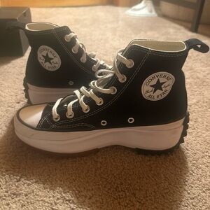 Converse women’s Black and White High-Top Sneakers